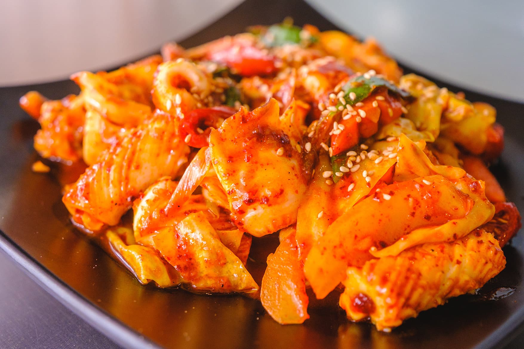 Spicy Stir-fried Squid, squid cooked with Korean-style spicy seasonings at Sagori